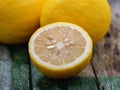 Fresh lemons on wooden table Royalty Free Stock Photo