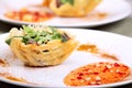 Fresh light salad in parmesan cheese basket Royalty Free Stock Photo