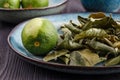 Fresh lime and dry leaf ready for cooking