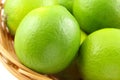 Fresh lime fruits in a basket Royalty Free Stock Photo