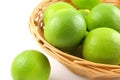 Fresh lime fruits in a basket Royalty Free Stock Photo