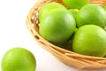 Fresh lime fruits in a basket Royalty Free Stock Photo