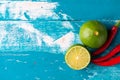 Fresh lime, half on wood background. Green citrus fruit Royalty Free Stock Photo