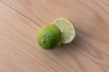 Fresh lime sliced on wooden background Royalty Free Stock Photo