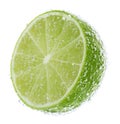 Fresh lime in sparkling water on white background Royalty Free Stock Photo