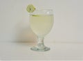 fresh lime water, lemo pani with lemon slice served in a glass isolated on grey background top view of indian, pakistani food Royalty Free Stock Photo