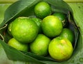 Fresh Limes In Banana Leaf Packaging Royalty Free Stock Photo