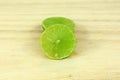 Fresh Limes on Wooden Background.