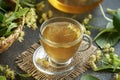 Fresh linden flowers in a cup of herbal tea Royalty Free Stock Photo