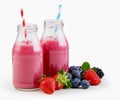 Fresh liquidised berry smoothies in bottles