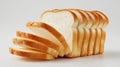 A fresh loaf of white sliced bread with a soft texture, fanned out on a white background Royalty Free Stock Photo