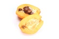 Fresh loquat fruit (Eriobotrya japonica) and a cut one