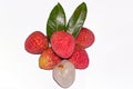 Fresh lychee fruit.Peeled and unpeeled Lychee fruit on white background with green leaves Royalty Free Stock Photo