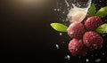 Fresh lychee fruit with water splash on black background Royalty Free Stock Photo