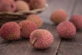 Fresh Lychees on wooden background