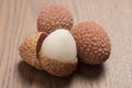 Fresh lychees on wooden background