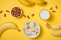 Fresh made banana smoothie in a glass on pink background Royalty Free Stock Photo