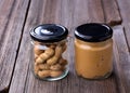 Fresh made creamy Peanut Butter in a glass jar Royalty Free Stock Photo