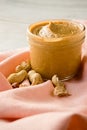 Fresh made creamy peanut butter in a glass Royalty Free Stock Photo