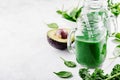 Fresh made green smoothie in bottle Royalty Free Stock Photo