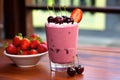 fresh-made smoothie with topped with a cherry Royalty Free Stock Photo