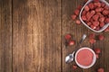 Fresh made Strawberry powder on a rustic background