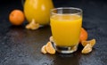 Fresh made Tangerine Juice close-up shot Royalty Free Stock Photo