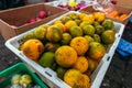 Fresh mandarins on a local organic food market. Bali island, Indonesia.