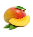 Fresh mango fruit with cut and green leafs Royalty Free Stock Photo