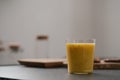 Fresh mango lulo smoothie on kitchen countertop Royalty Free Stock Photo