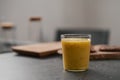 Fresh mango lulo smoothie on kitchen countertop Royalty Free Stock Photo