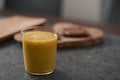 Fresh mango lulo smoothie on kitchen countertop Royalty Free Stock Photo