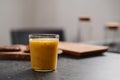Fresh mango lulo smoothie on kitchen countertop Royalty Free Stock Photo