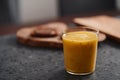 Fresh mango lulo smoothie on kitchen countertop Royalty Free Stock Photo