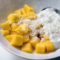 Fresh Mango with Shredded Coconut and Yogurt Royalty Free Stock Photo