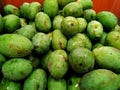 Fresh mangoes on display at outdoor farmers market mango and green healty fruit food fresh mango, green mangoes raw Royalty Free Stock Photo