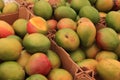 Fresh mangos on a market stall Royalty Free Stock Photo