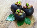 Fresh mangosteen fruit on wood Royalty Free Stock Photo