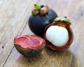 Fresh mangosteen fruit on wood Royalty Free Stock Photo