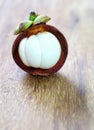 Fresh mangosteen fruit on wood Royalty Free Stock Photo