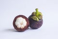 Fresh, mangosteen Garcinia mangostana isolated on white background.