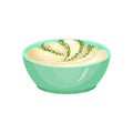 Fresh mayonnaise with green herbs in turquoise ceramic dip bowl. Creamy sauce for dressing dishes. Culinary theme