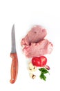 Fresh meat with garlic, tomato, pepper ready to cook with Ingredient, Top view of raw steak on cutting board with spices and knife Royalty Free Stock Photo