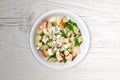 Fresh Meditteranean Salad on Contemporary White Wood Background Royalty Free Stock Photo