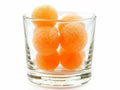 Fresh Melon Balls in a Glass on White Background Royalty Free Stock Photo