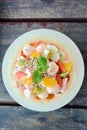 Fresh melon fruit salad on wood table Royalty Free Stock Photo