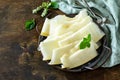 Fresh melons sliced to pieces on rustic wooden table. Royalty Free Stock Photo