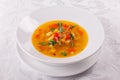 Fresh Mexican tomato soup with corn and vegetables. bowl of bean soup with rosemary. like chili con carne with tacos Royalty Free Stock Photo