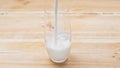 fresh milk pouring into glass on Royalty Free Stock Photo