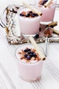 Fresh milkshake, yogurt, dessert, smoothie with strawberry decorated grated chocolate and frozen blueberries Royalty Free Stock Photo